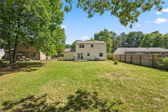 view of yard with a fenced backyard