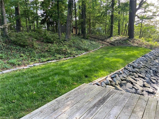 view of yard with a wooden deck