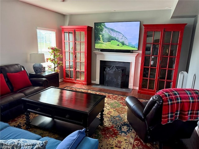736 Arbuckle St, Chesapeake, VA 23323 - living room with baseboards, a fireplace, and wood finished floors