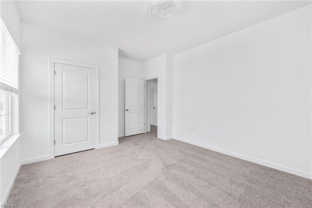411 Middleton Way, Chesapeake, VA 23322 - unfurnished bedroom featuring baseboards, multiple windows, and carpet