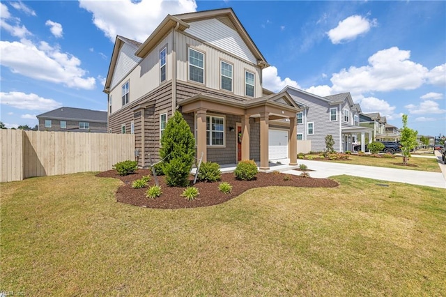 411 Middleton Way, Chesapeake, VA 23322 - view of front facade with fence, concrete driveway, a garage, a front lawn, and board and batten siding