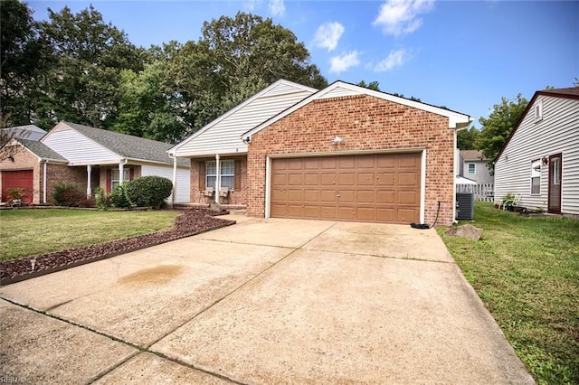 ranch-style house featuring a garage, concrete driveway, a front lawn, and brick siding