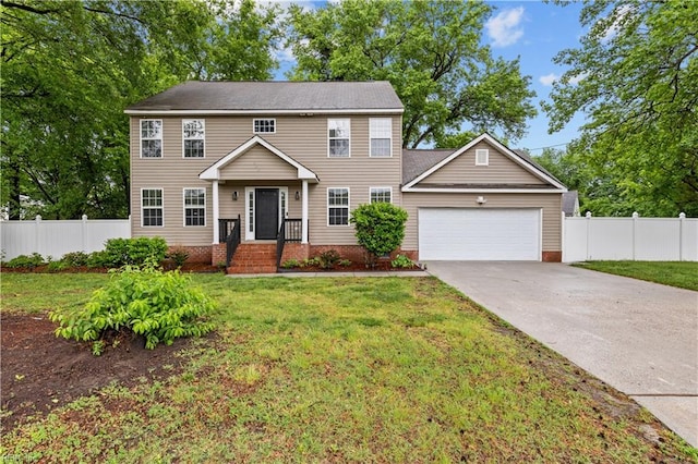 390 Naval Base Rd, Norfolk, VA 23505 - colonial-style house featuring fence, an attached garage, concrete driveway, and a front yard