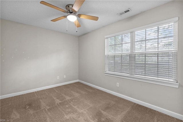 390 Naval Base Rd, Norfolk, VA 23505 - spare room featuring carpet flooring, a ceiling fan, a textured ceiling, visible vents, and baseboards