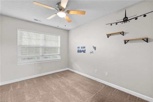 390 Naval Base Rd, Norfolk, VA 23505 - carpeted empty room featuring a textured ceiling, baseboards, a ceiling fan, and visible vents