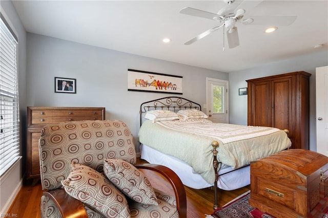 bedroom featuring a ceiling fan, dark wood-style flooring, baseboards, and recessed lighting