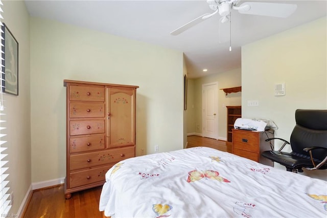 bedroom featuring recessed lighting, baseboards, a ceiling fan, and wood finished floors