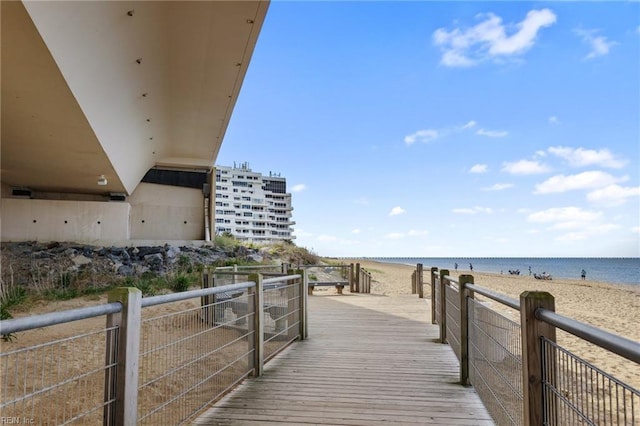 view of community featuring a view of the beach and a water view