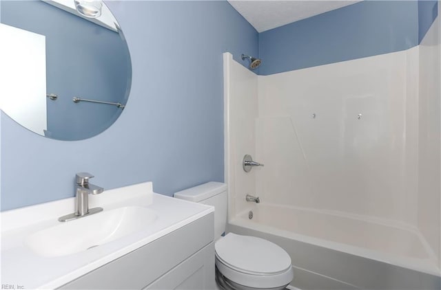 full bathroom featuring vanity, toilet, and tub / shower combination