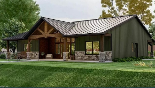 LOT3 Alliance Rd, Surry, VA 23883 - rear view of house featuring metal roof, a standing seam roof, stone siding, and a yard