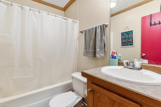 bathroom with a textured ceiling, toilet, vanity, crown molding, and shower / bathtub combination with curtain