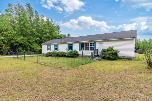 view of front of house featuring a front yard, fence, and crawl space