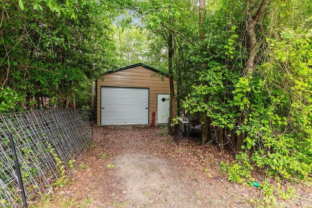 detached garage with fence