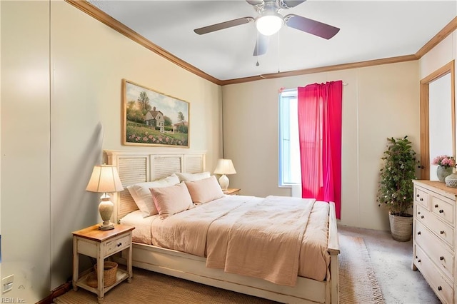 bedroom with ceiling fan and ornamental molding