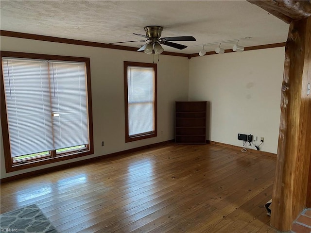 3810 Seaford Rd, Seaford, VA 23696 - unfurnished room with ornamental molding, hardwood / wood-style floors, and a ceiling fan