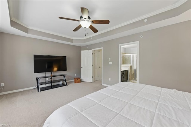 bedroom featuring carpet flooring, crown molding, baseboards, a tray ceiling, and a ceiling fan