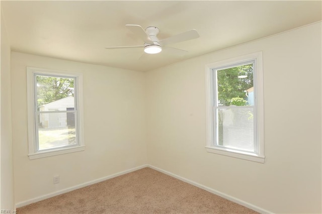 48 Pollux Cir W, Portsmouth, VA 23701 - empty room featuring baseboards, carpet flooring, and a ceiling fan