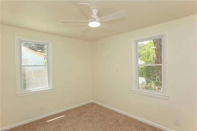 48 Pollux Cir W, Portsmouth, VA 23701 - unfurnished room with baseboards, plenty of natural light, ceiling fan, and carpet