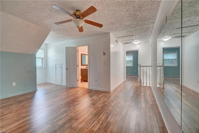 490 Poplar Lawn Rd, Surry, VA 23883 - bonus room featuring a textured ceiling, wood finished floors, baseboards, and ceiling fan