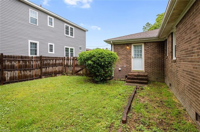 view of yard featuring entry steps