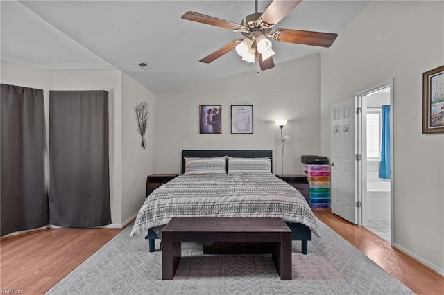 1409 Shady Tree Way, Chesapeake, VA 23323 - bedroom with wood finished floors, baseboards, lofted ceiling, ceiling fan, and ensuite bathroom