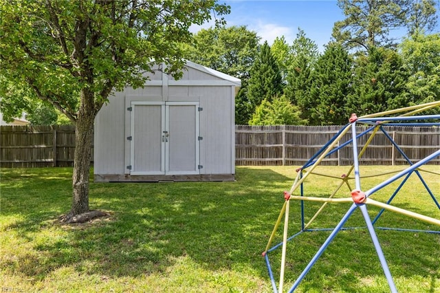 1409 Shady Tree Way, Chesapeake, VA 23323 - view of yard featuring a playground, a storage shed, and an outdoor structure