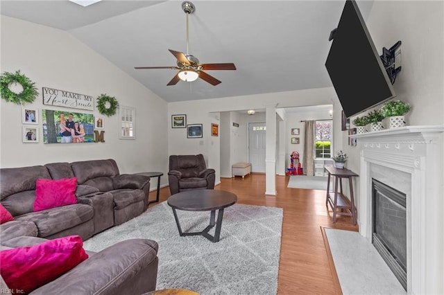 1409 Shady Tree Way, Chesapeake, VA 23323 - living room with wood finished floors, lofted ceiling, ceiling fan, and a premium fireplace