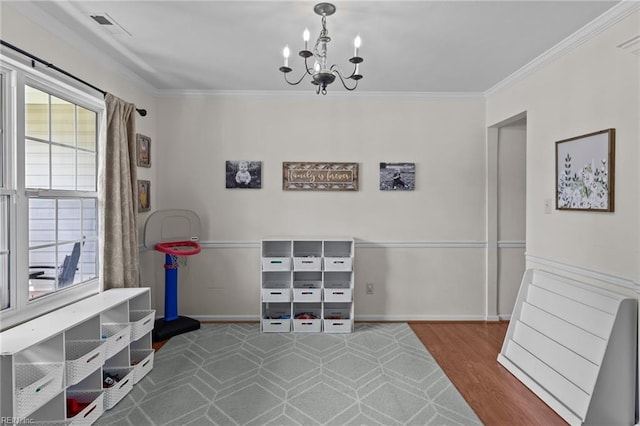 1409 Shady Tree Way, Chesapeake, VA 23323 - game room featuring a chandelier, crown molding, wood finished floors, and baseboards