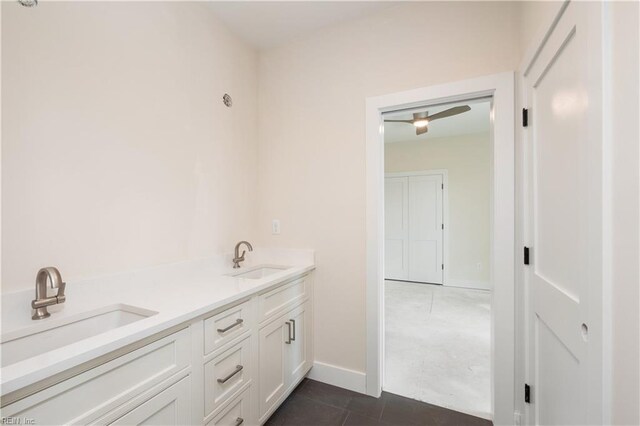 402 48th St, Virginia Beach, VA 23451 - full bath with baseboards, double vanity, and a sink