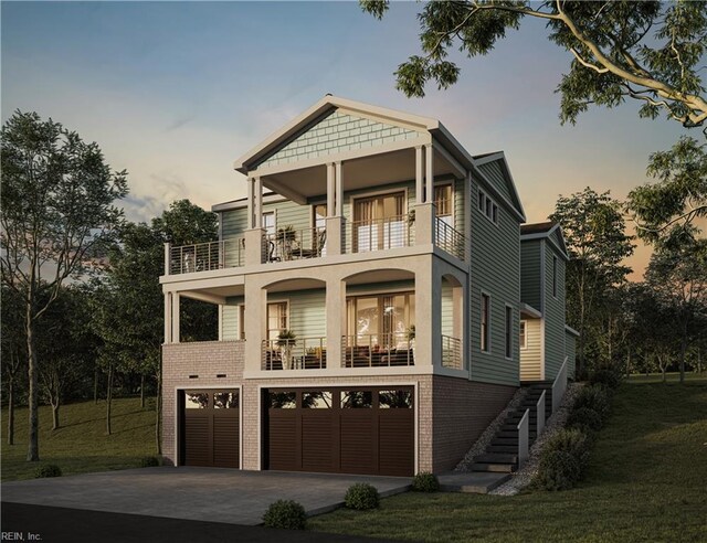 402 48th St, Virginia Beach, VA 23451 - view of front of home featuring a balcony, brick siding, a garage, concrete driveway, and stairway
