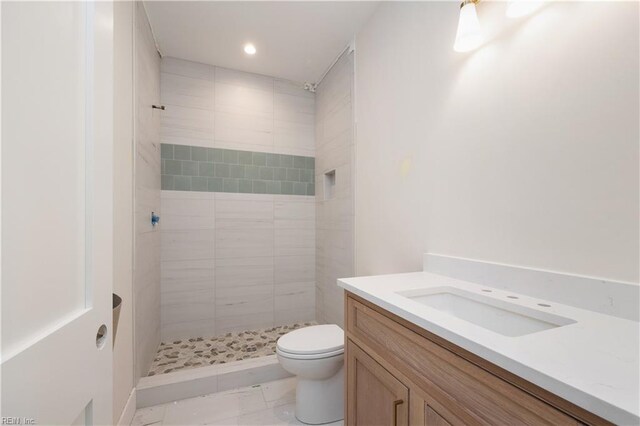 402 48th St, Virginia Beach, VA 23451 - bathroom with vanity, toilet, tiled shower, and recessed lighting