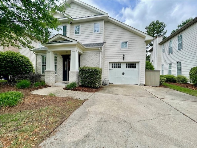 452 Blue Beech Way, Chesapeake, VA 23320 - view of front facade featuring a garage, driveway, and brick siding