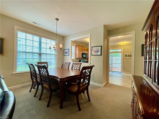 452 Blue Beech Way, Chesapeake, VA 23320 - dining area featuring a chandelier, light carpet, baseboards, and plenty of natural light
