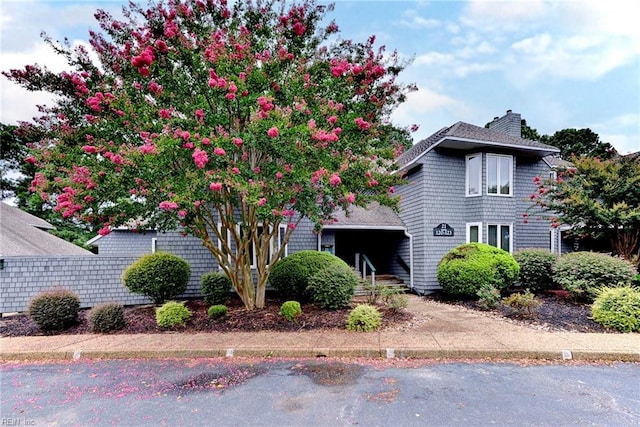 view of front of property with a chimney