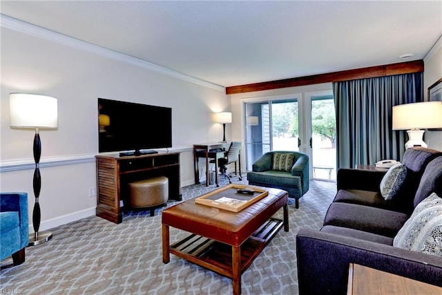 living area with baseboards, crown molding, and carpet