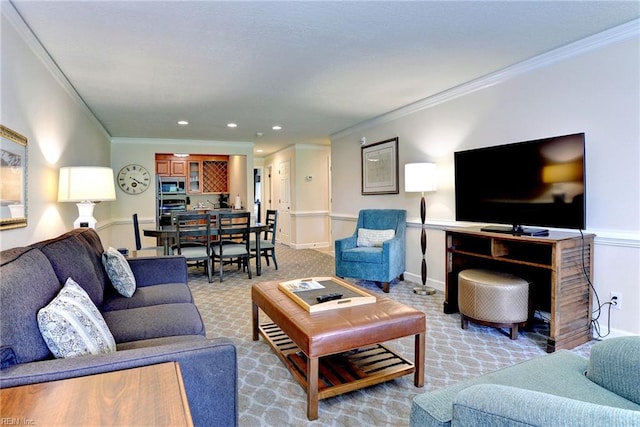 living room with ornamental molding, carpet floors, and recessed lighting