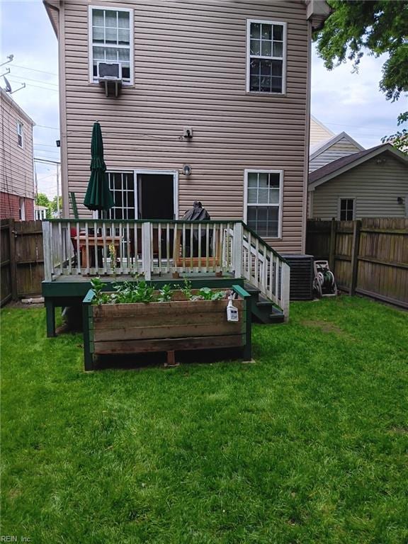 1815 Tidewater Dr, Norfolk, VA 23504 - rear view of property with a wooden deck and central AC