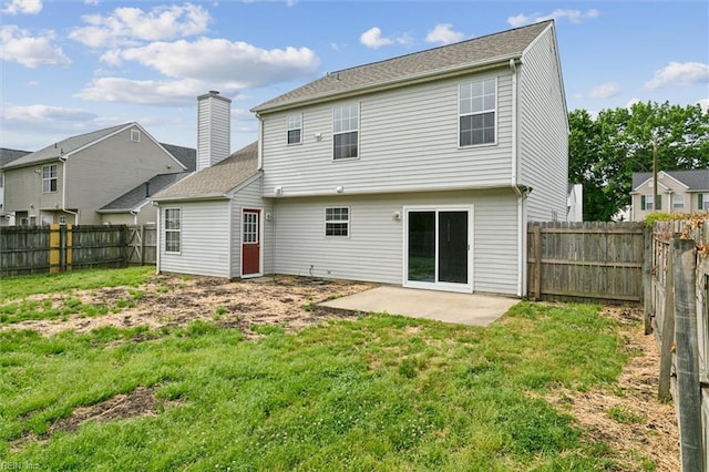 back of property with a patio area