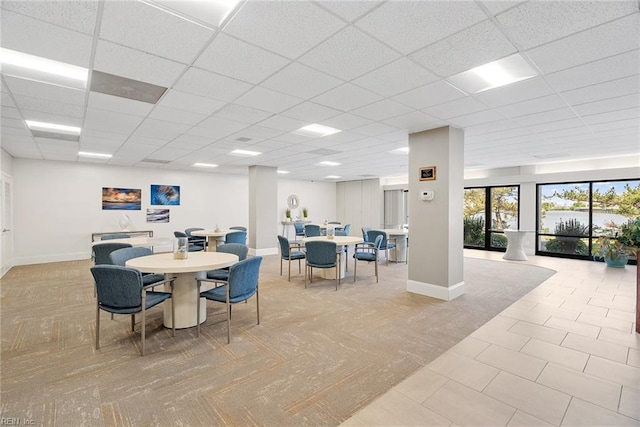 500 Pacific Ave Unit 812, Virginia Beach, VA 23451 - dining room featuring baseboards and a drop ceiling