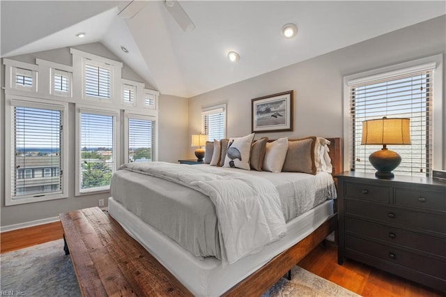 bedroom featuring lofted ceiling, recessed lighting, and wood finished floors