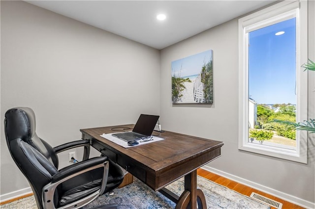 office area featuring recessed lighting, baseboards, visible vents, and wood finished floors
