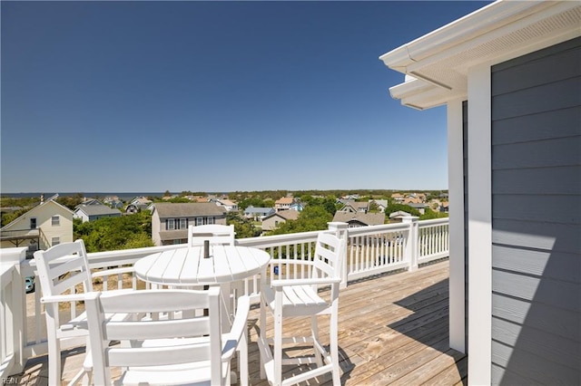 wooden deck featuring a residential view