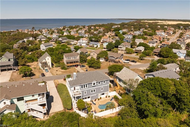 aerial view with a water view and a residential view