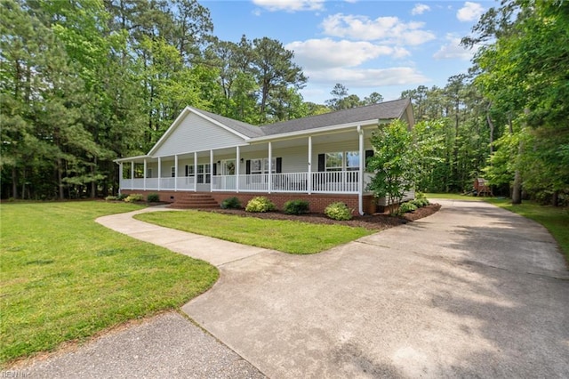 108 Hodges Cove Rd, Yorktown, VA 23692 - view of front facade featuring a porch, a front yard, driveway, roof with shingles, and crawl space