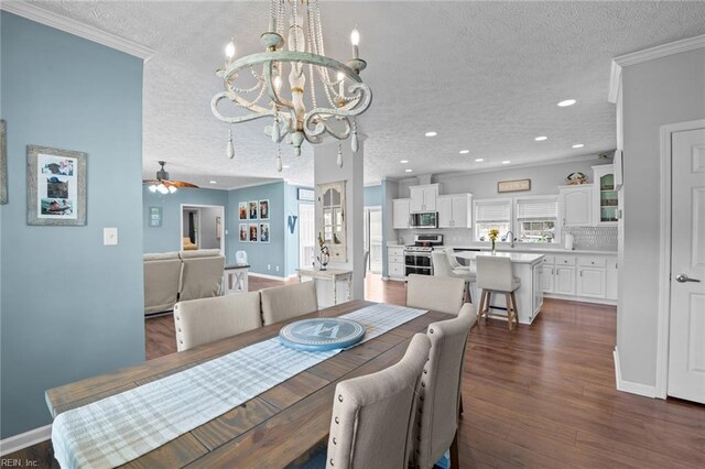 108 Hodges Cove Rd, Yorktown, VA 23692 - dining space featuring a textured ceiling, a chandelier, ornamental molding, recessed lighting, and dark wood finished floors
