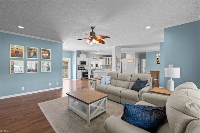 108 Hodges Cove Rd, Yorktown, VA 23692 - living room featuring dark wood finished floors, ceiling fan, a textured ceiling, baseboards, and recessed lighting