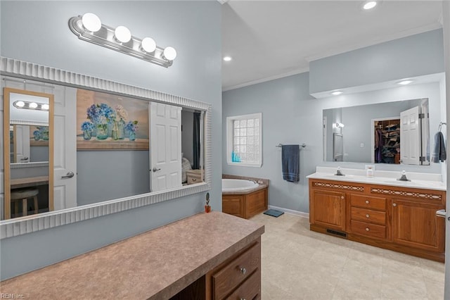 108 Hodges Cove Rd, Yorktown, VA 23692 - full bath with crown molding, vanity, a garden tub, recessed lighting, and baseboards