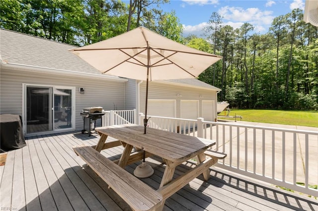 108 Hodges Cove Rd, Yorktown, VA 23692 - wooden terrace with outdoor dining space, a grill, a garage, and a yard