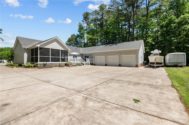 108 Hodges Cove Rd, Yorktown, VA 23692 - single story home featuring a sunroom, driveway, and a garage