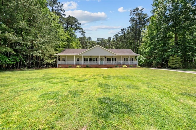 108 Hodges Cove Rd, Yorktown, VA 23692 - view of front of property featuring covered porch and a front lawn